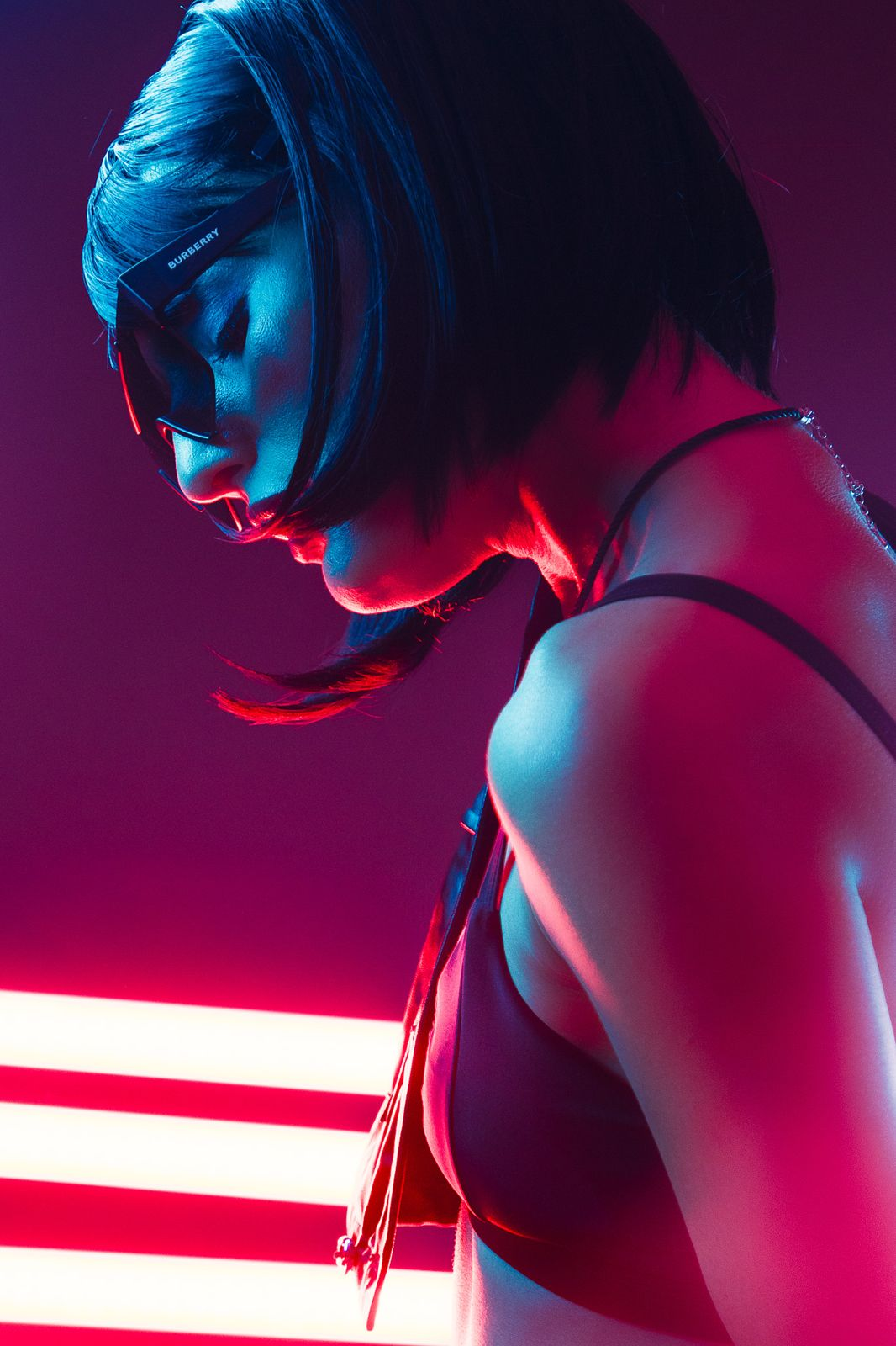 Profile portrait under neon light